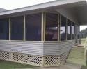 We built this new closed-in patio including installing the siding, roof and steps!